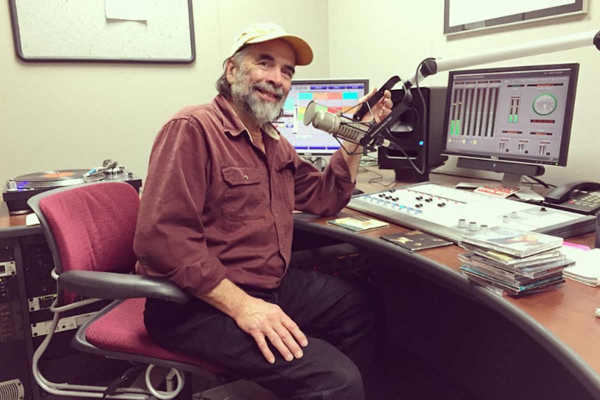 Former KRVS radio host Lee Kleinpeter sits behind the microphone in the Cypress Lake studio in 2016.