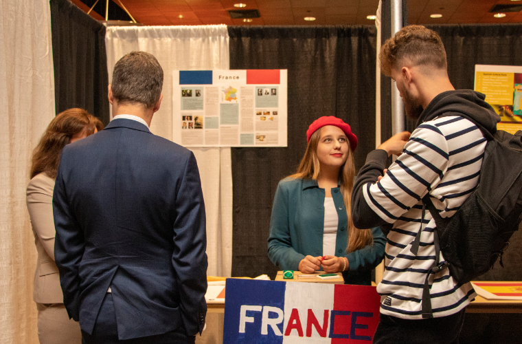 Students presenting on France at a cultural event at the University of Louisiana at Lafayette.