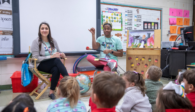 UL Lafayette students presenting instruction to group of small children