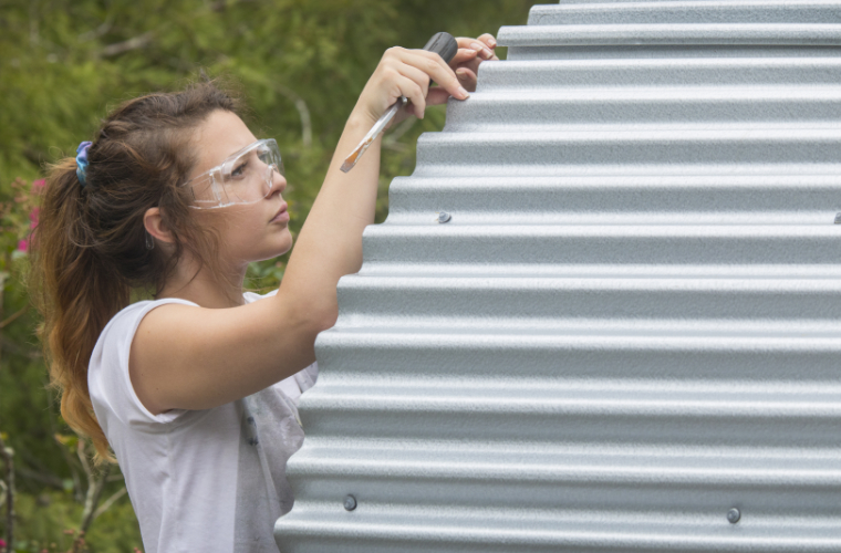 An architecture student working on a building for her local community in Louisiana.