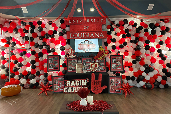 Businesses “Paint the Town Red” for University Homecoming contest ...