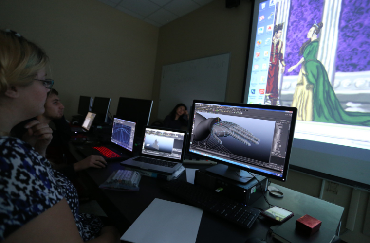 Animation majors at the University of Louisiana at Lafayette work on computers in a classroom