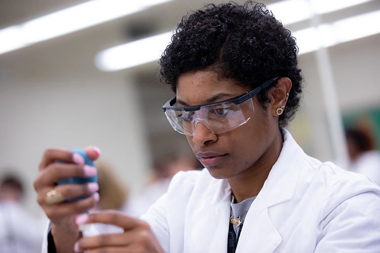 A student in the forensics minor at the University of Louisiana at Lafayette learns how to use chemistry to investigate crime scenes