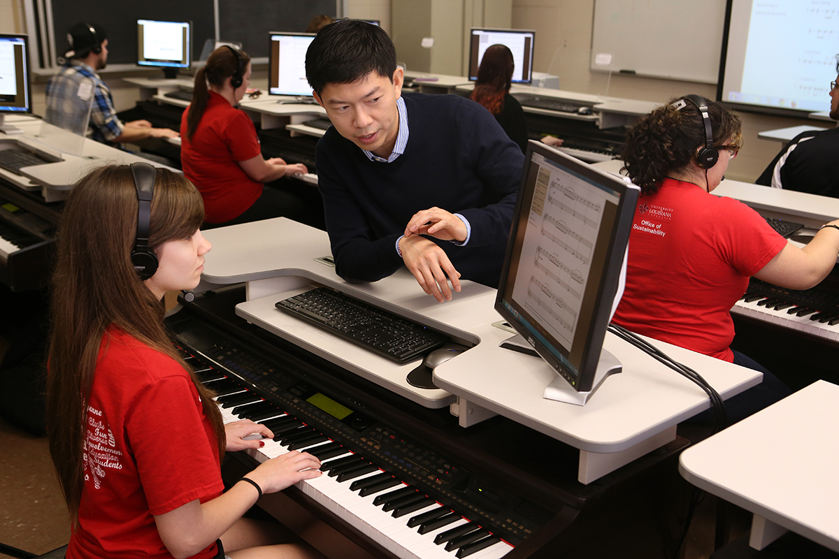 Chan Kiat Lim works with music student