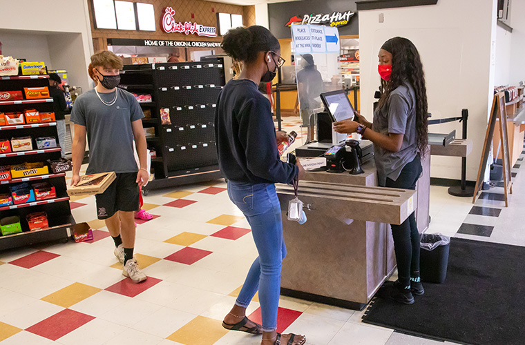 Students using their Cajun Card on campus at UL Lafayette.