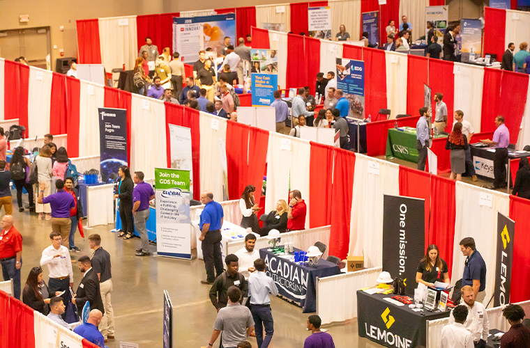 An aerial view of students and employers interacting at our All Majors Career Fair