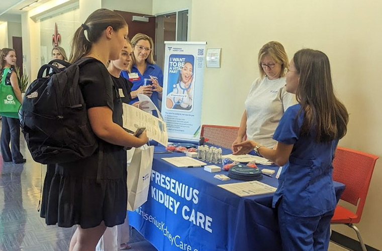 Nursing students interacting with an employer at our Nursing Career Fair