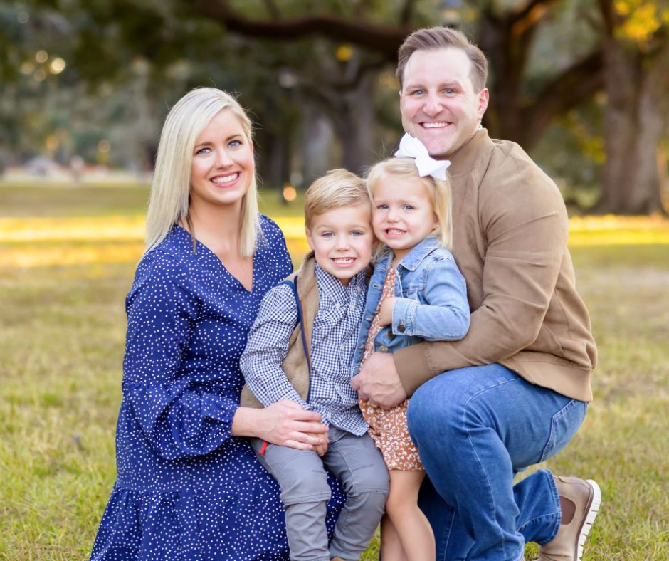 John Gros is pictured outdoors with his wife and young children. Gros earned his general studies degree online through UL Lafayette.