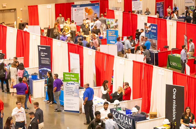 An aerial view of UL Lafayette students and employers interacting at the Career Fair