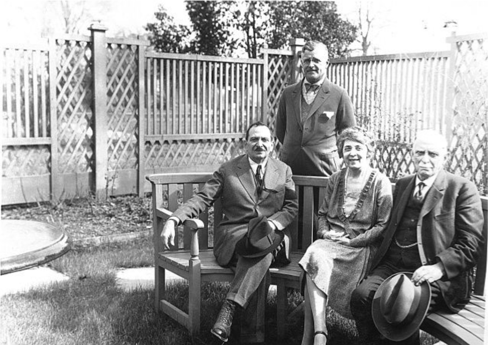 Henri Bendel is seated in Edwin Stephen's garden at the president's house.