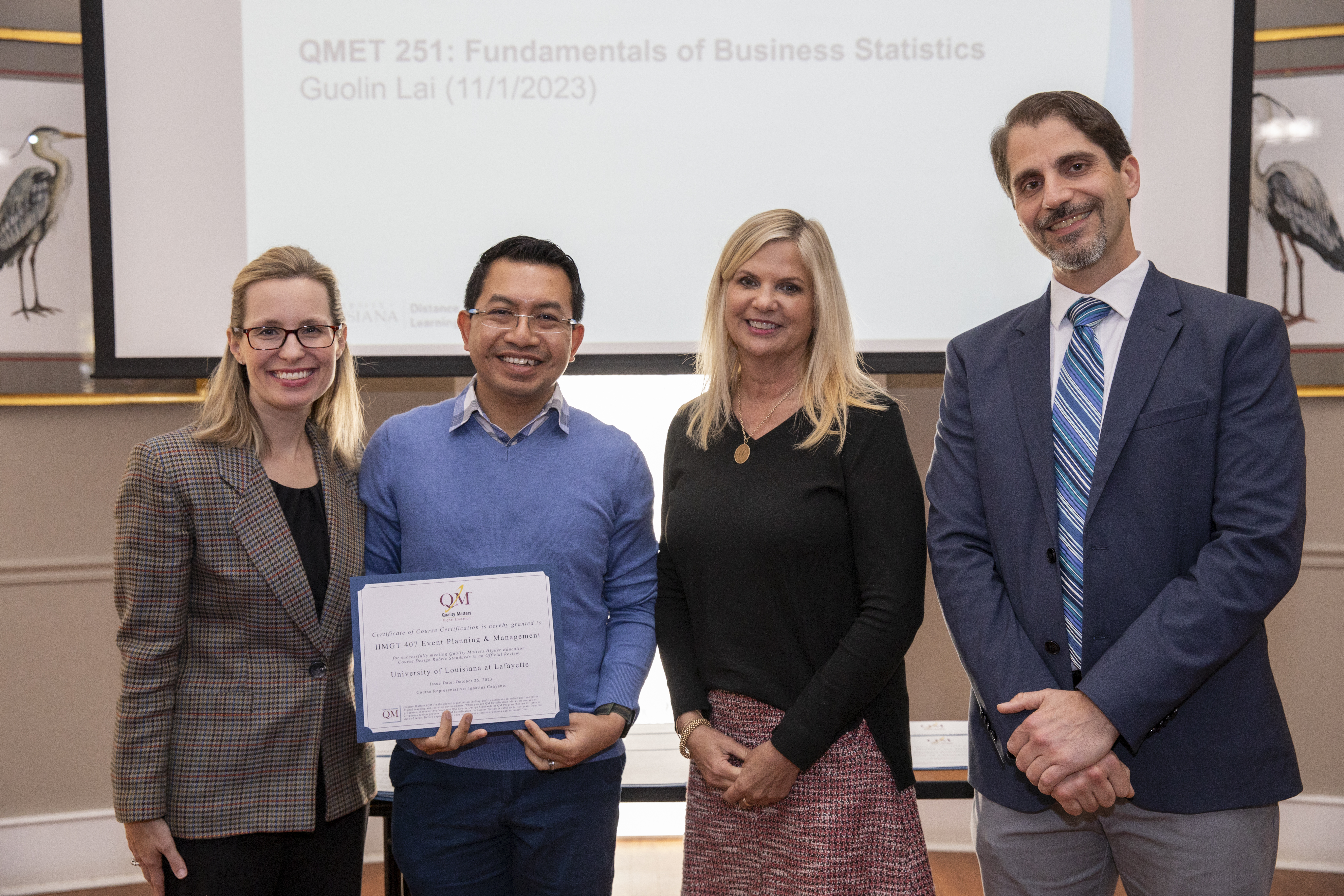 Dr. Claire Arabie, director for the Office of Distance Learning, is pictured alongside Dr. Ignatius Cahyanto and Dr. Patricia Lanier, Department of Management, as well as Francesco Crocco, during the QM Course Certification breakfast. 