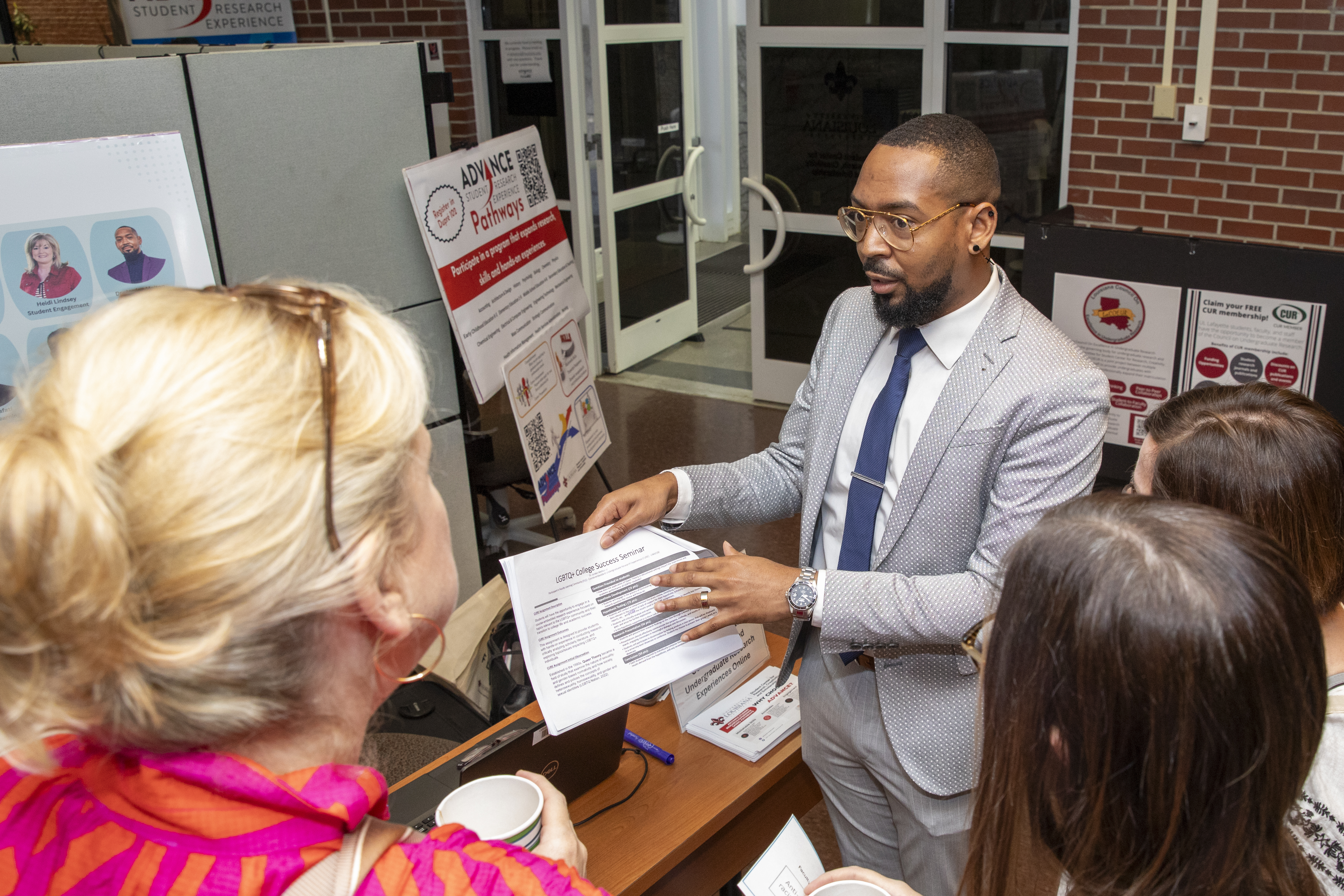 A recent FLC participant presents on their community's findings during the FLC showcase.