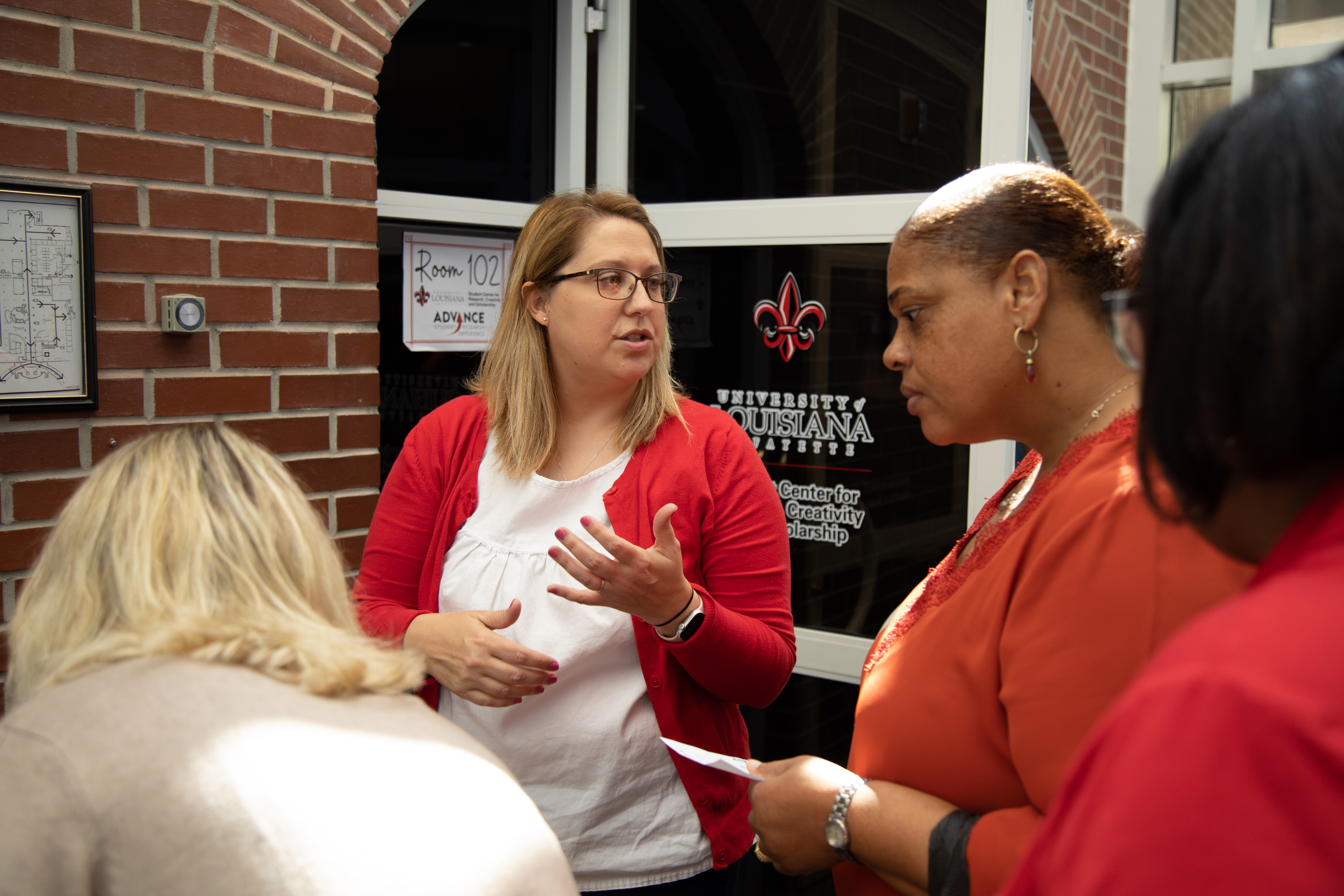 A recent FLC participant presents on their community's findings during the FLC showcase. The showcase is one of the events held by the Office of Distance Learning each year.