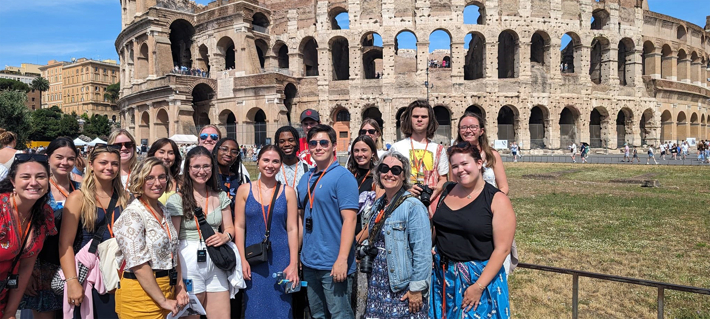 A group of UL Lafayette students standing in front of the colosseum on a study abroad trip