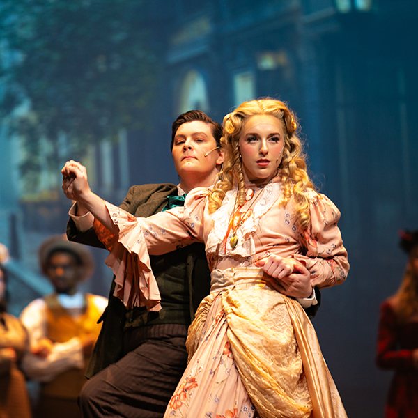 UL students in costume on stage