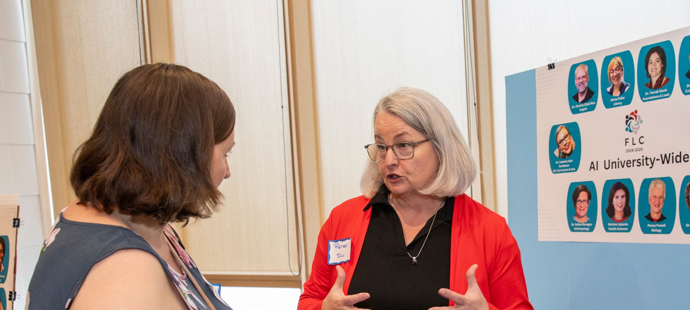 Distance Learning advisor speaking with a UL Lafayette faculty member