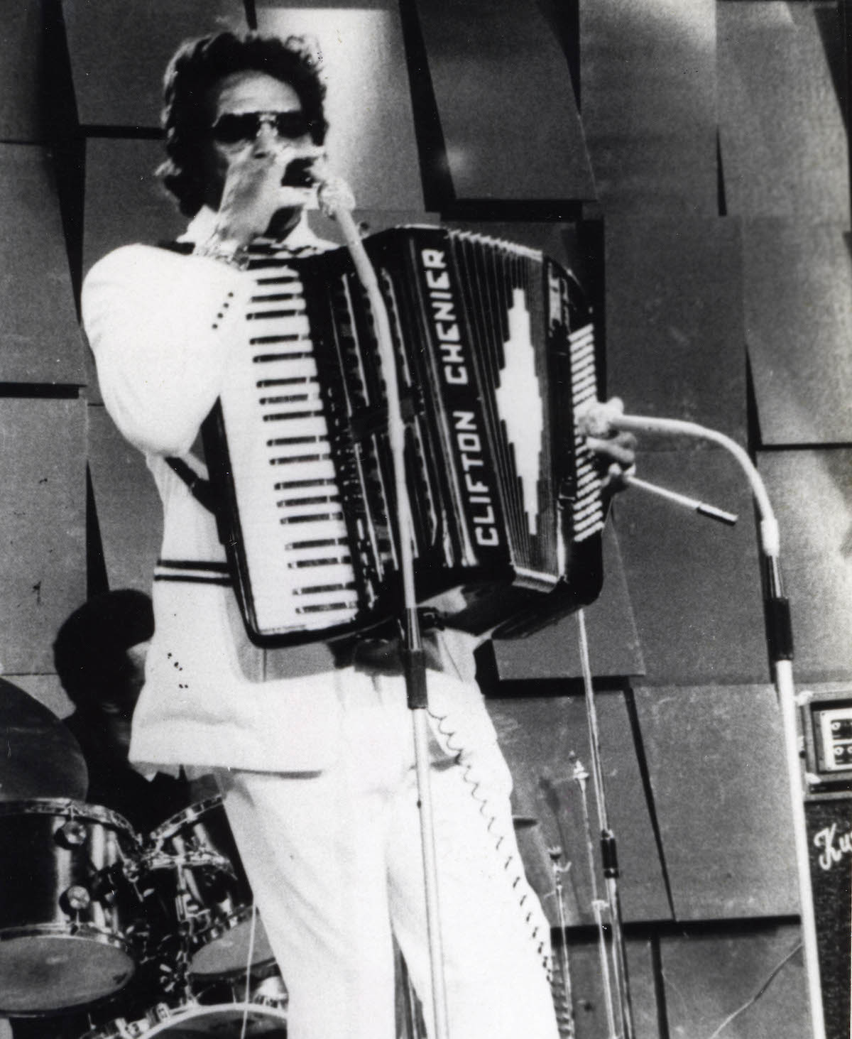 Clifton Chenier with his accordian on stage in the 1970s.