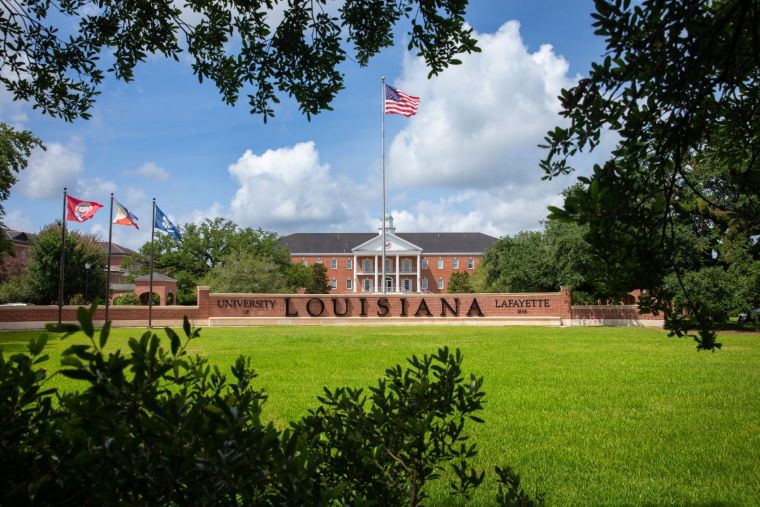 The red brick University of Louisiana at Lafayette Welcome Wall in front of Martin Hall
