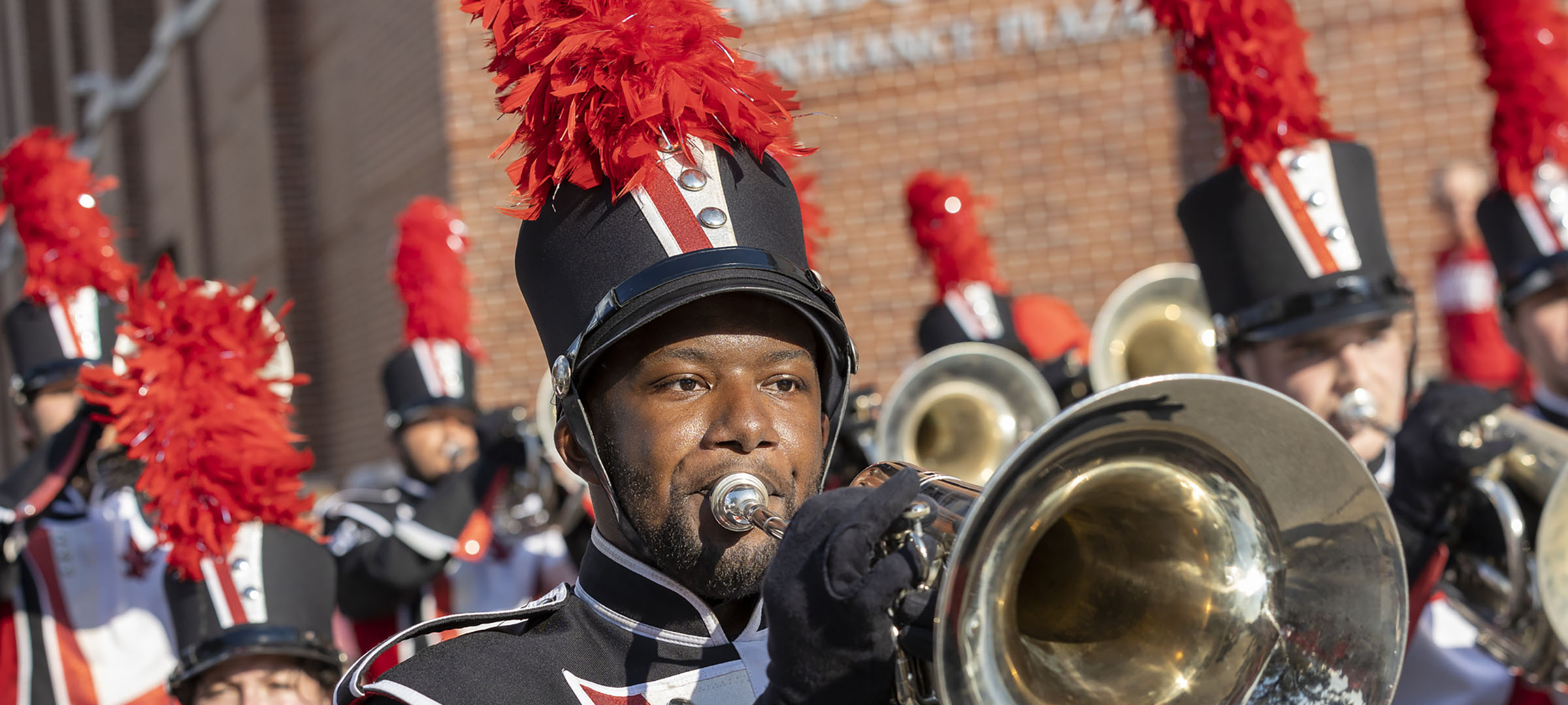 UL student plays trumpet in UL marching band