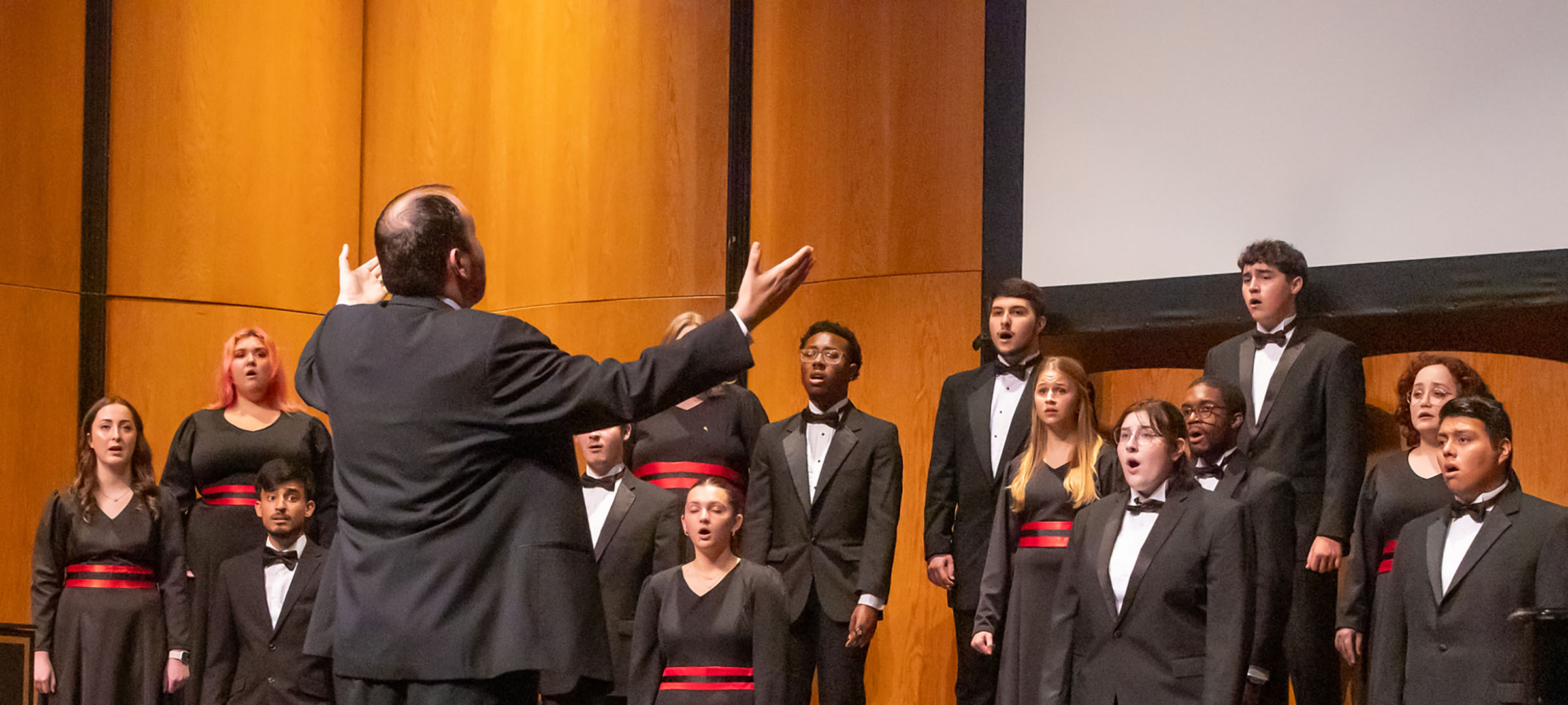 UL Choir performs on stage in Angelle Hall