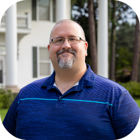 Mike Williams pictured in front of Whittington House. 