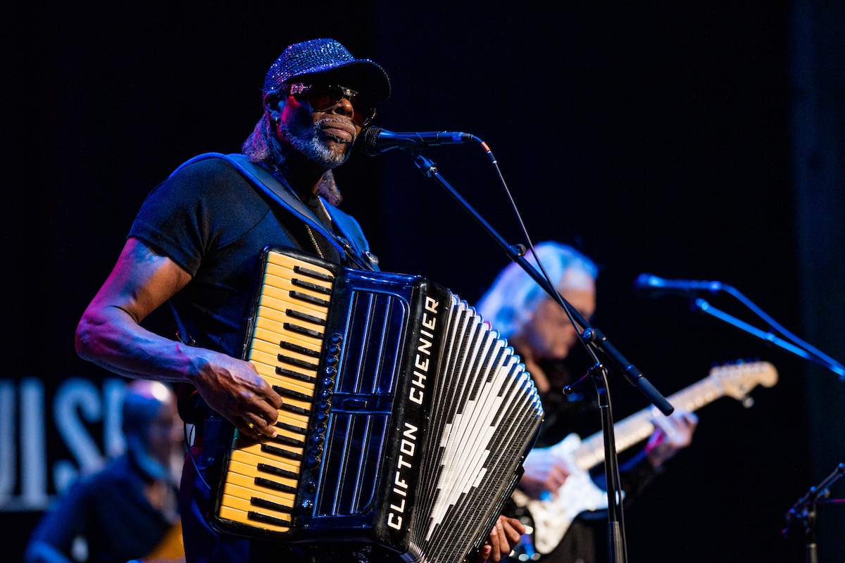 Zydeco frontman C.J. Chenier plays his father, Clifton Chenier's, iconic black-and-white accordion at a sold-out show at the Acadiana Center for the Arts.
