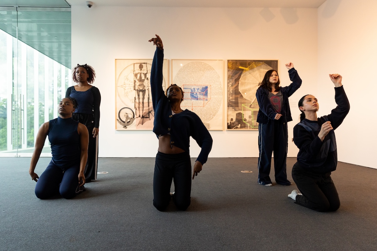 Students from the UL Lafayette Dance Program perform in front of Rauschenberg’s “Autobiography” at the Hilliard Art Museum.