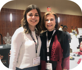 Ashley Mudd smiles as recipient of the 2020 Emerging Leader Award at UL Lafayette's Women's Leadership Conference. 