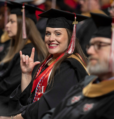 Amanda Devillier smiles for a picture during her Commencement ceremony.