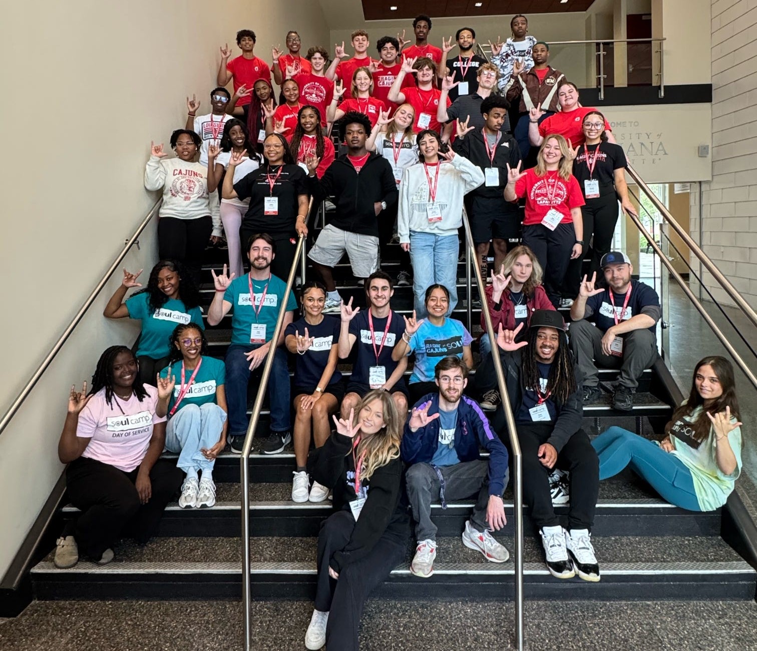 Group photo of the 2026 SOUL Camp Mentors posed on stairs.