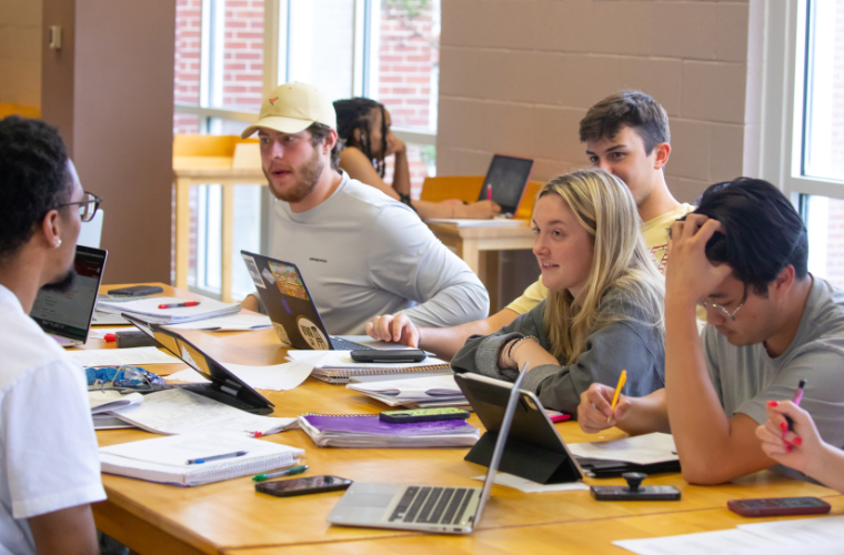 UL Lafayette students studying together at the library