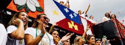 UL Lafayette sorority members on a homecoming float.
