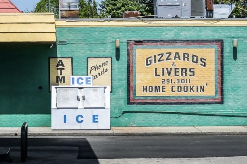 An image of the exterior of a convenience store.