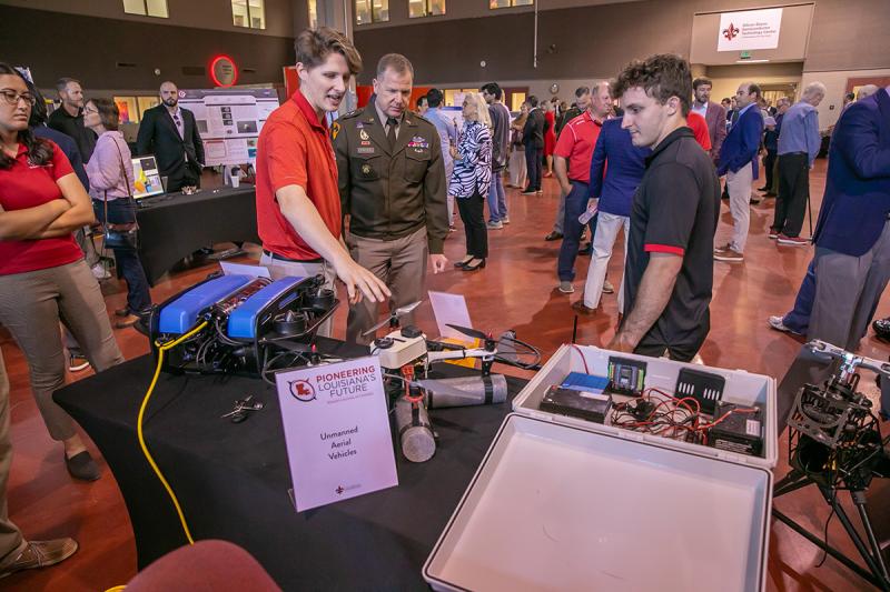 Students present research during the Pioneering Louisiana event