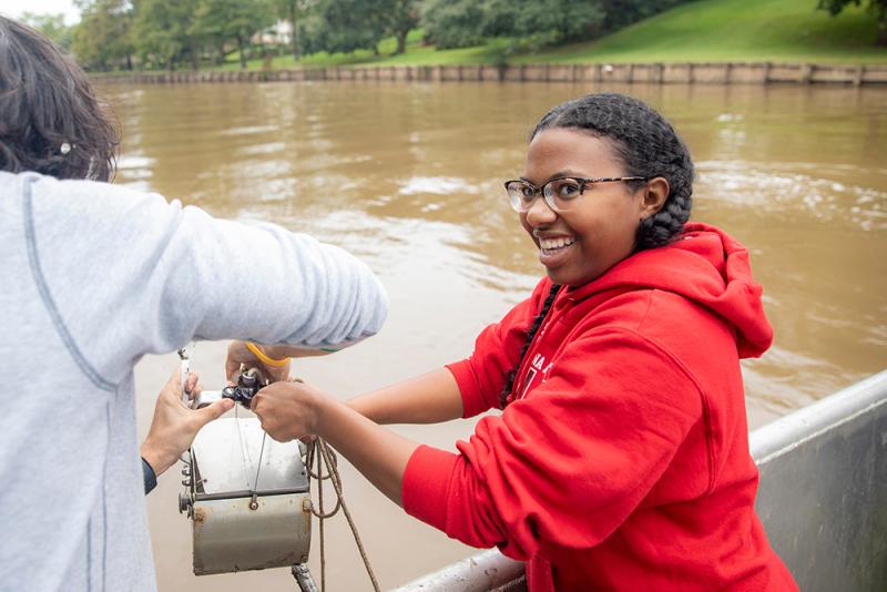 University of Louisiana at Lafayette biology major April Pruitt conducting water research as part of class