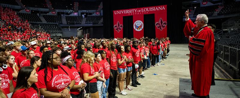 President Savoie speaking to students at New Student Convocation in the Cajundome