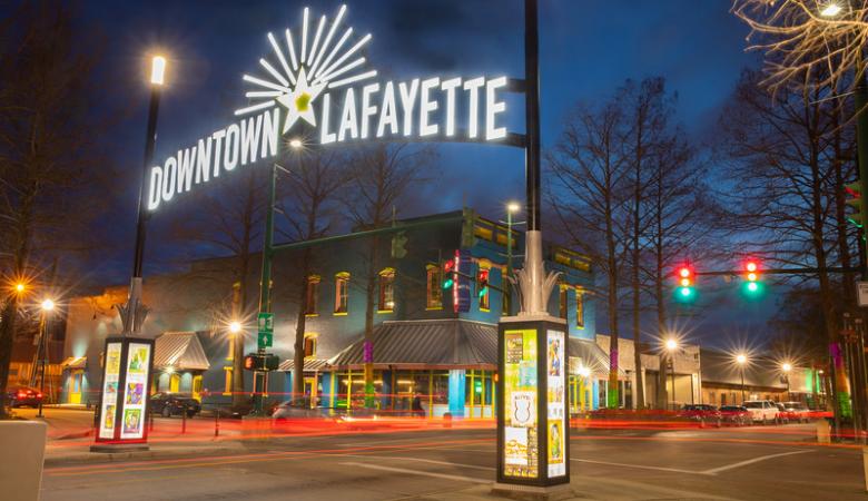 Downtown Lafayette neon sign lit up at night