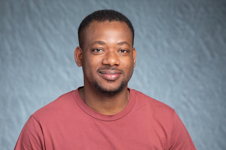 Professional portrait photo of Clement Okolo.