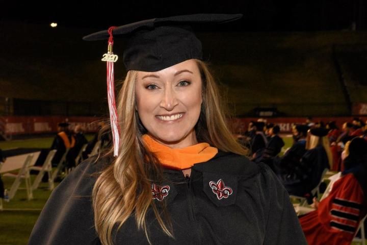Loretta Heggelund poses for a photo after receiving her M.S. in Nursing degree.