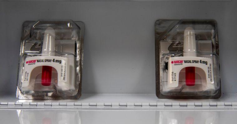 Two NARCAN nasal spray kits sit side by side in one of the opioid overdose kits on the University's campus.