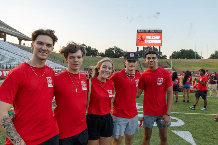 Students on Cajun Field at the end of New Student Convocation