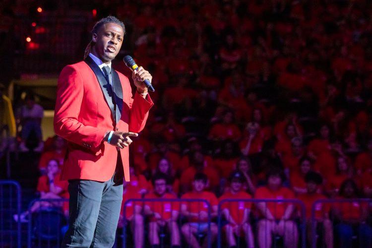 An upperclassmen student speaking at New Student Convocation at the Cajundome