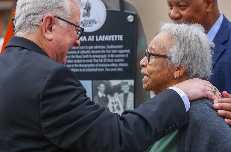 Dr. Savoie and Joyce Constantine Henson celebrate the unveiling of the ninth marker along the Louisiana Civil Rights Trail at the Pillars of Progress on the UL Lafayette campus.