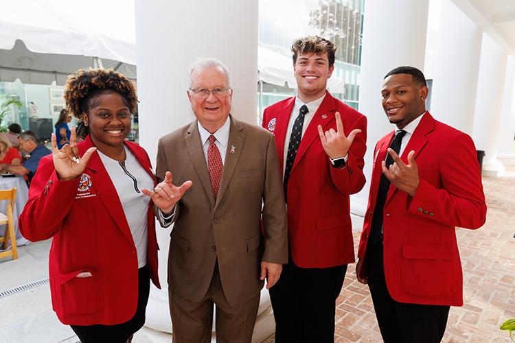 Dr. Savoie and Presidential Student Ambassadors at the 2025 Fortiter Feliciter Fideliter Employee Awards & Retiree Recognition