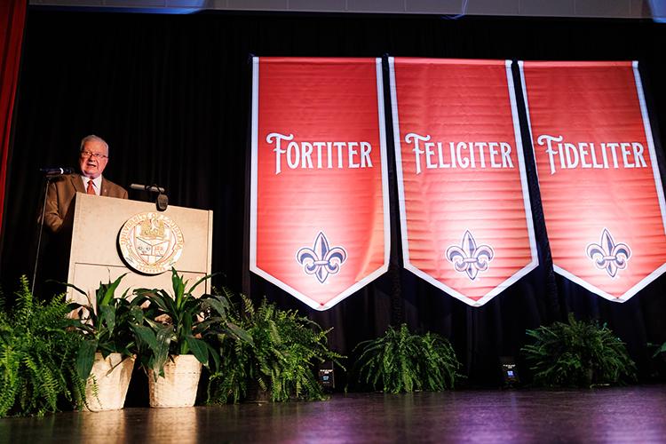 Dr. Savoie speaking at the Fortiter Fideliter Feliciter 2025 Employee Awards & Retiree Recognition Ceremony. 