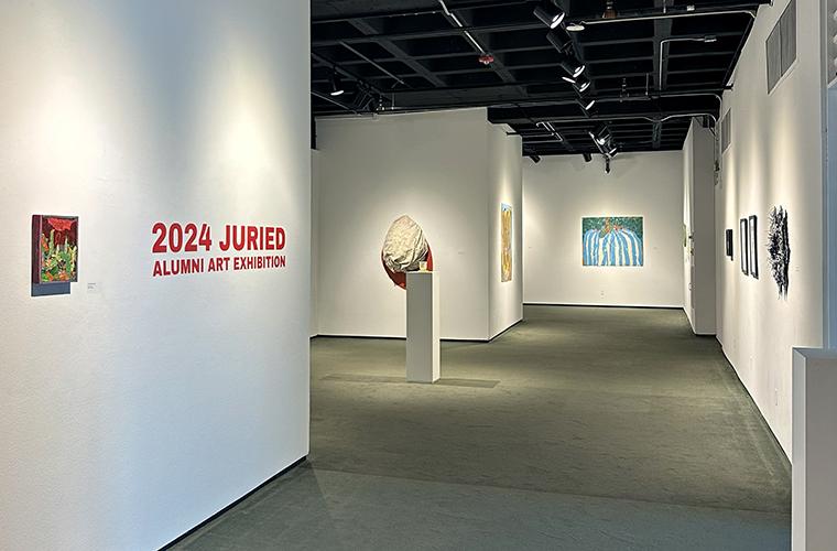Art hangs on the walls of the Flecther Hall Gallery