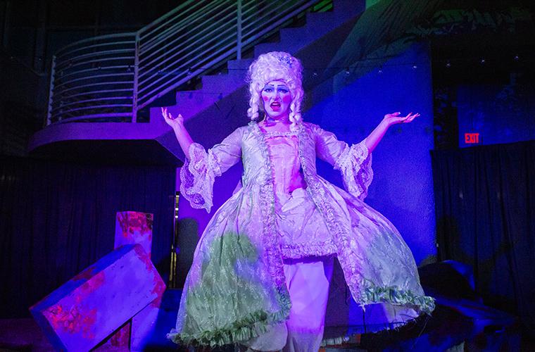 UL student sings in 17th century French dress and white wig