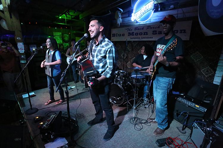 UL students perform Cajun music on stage