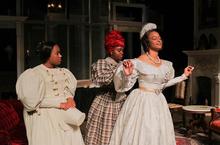UL Lafayette theatre students act out a scene in period clothing