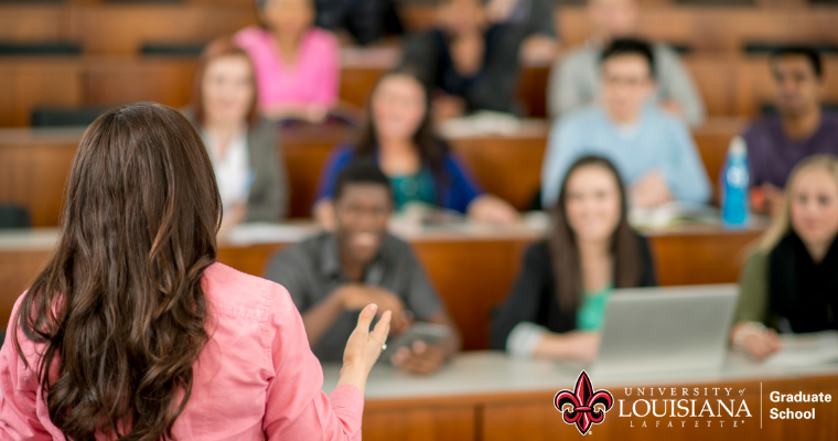 Teacher with her back to students instructing